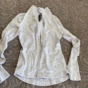 White zip up athletic jacket with thumb holes!